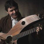 Paul Thompson Harp Guitarist